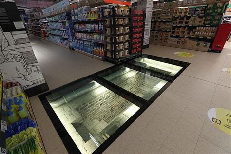 lidl muller road|Lidl built on Viking ruins has a glass floor to show house below.